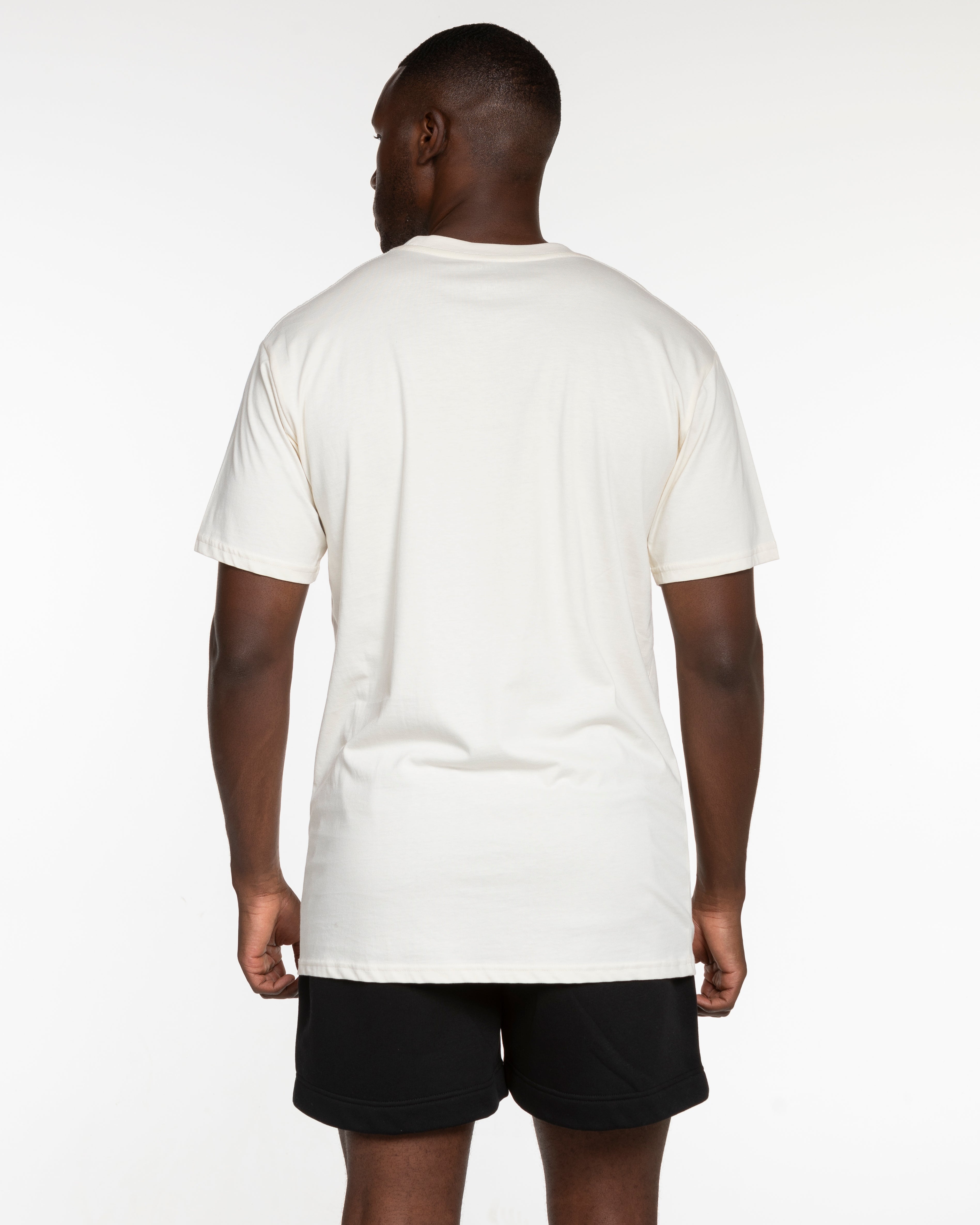 The Mens Tee - Off White - Odyssey - Center Chest Stacked - Black