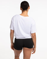 The Crop Tee - White - Ignite Barre & Fitness - Center Chest "IGNITE" - Printed - Black
