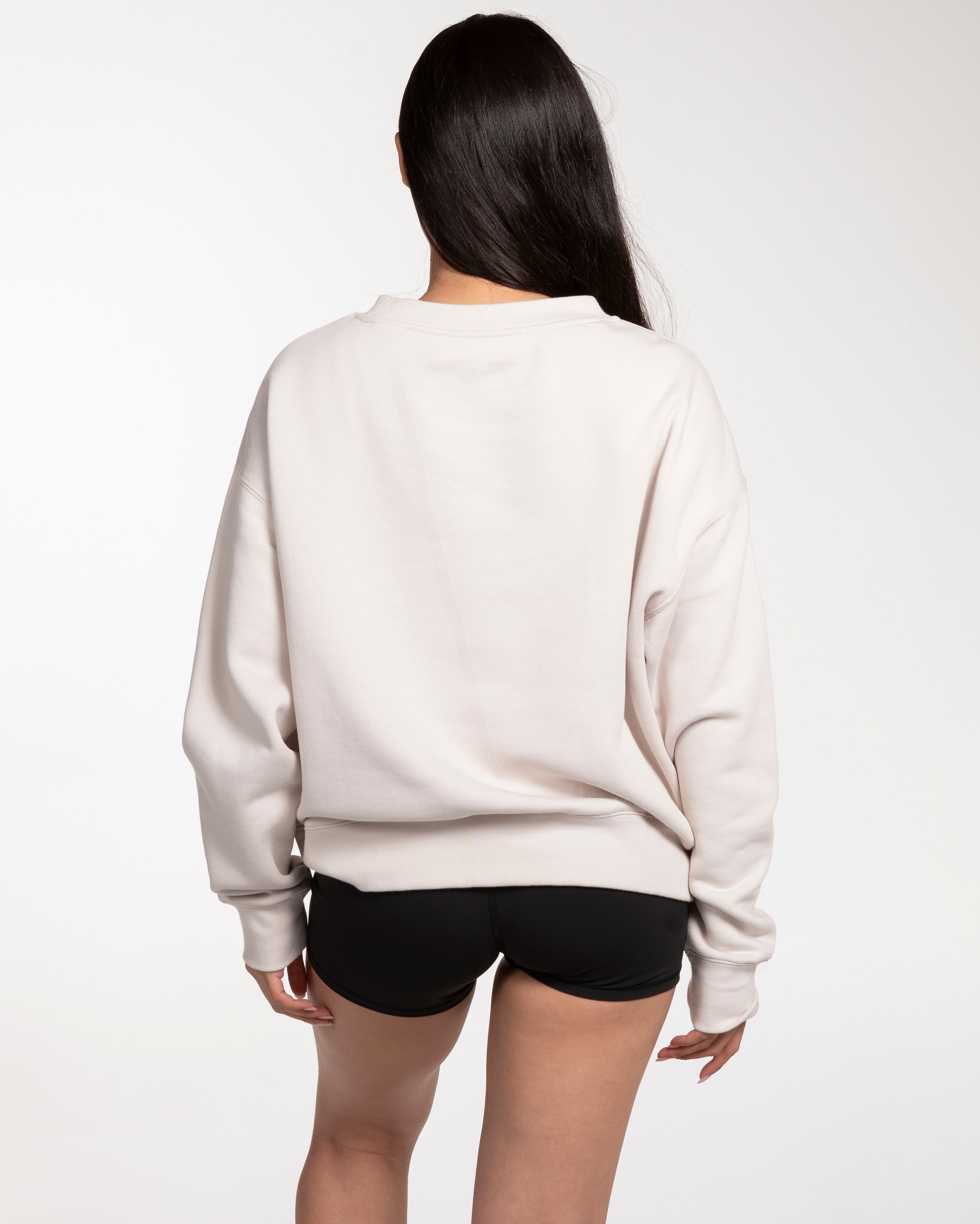 The Womens Crewneck - Bone - Ignite Barre - Center Chest Stacked - UCLA Blue Printed