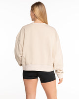 The Studio Crop - Latte - Ignite Barre & Fitness - Center Chest Arc Stacked - Printed - White