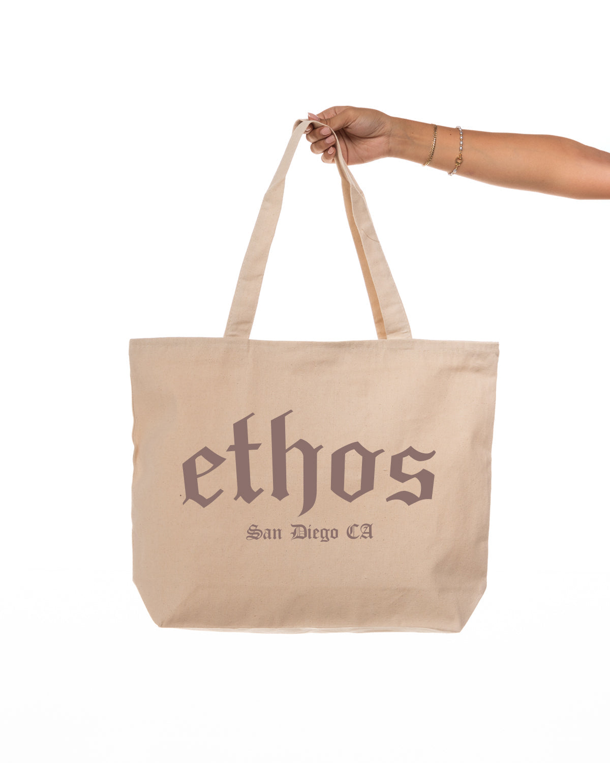 The Zipper Tote Bag - Natural - Ethos Old English - Front Center Stacked - Clay