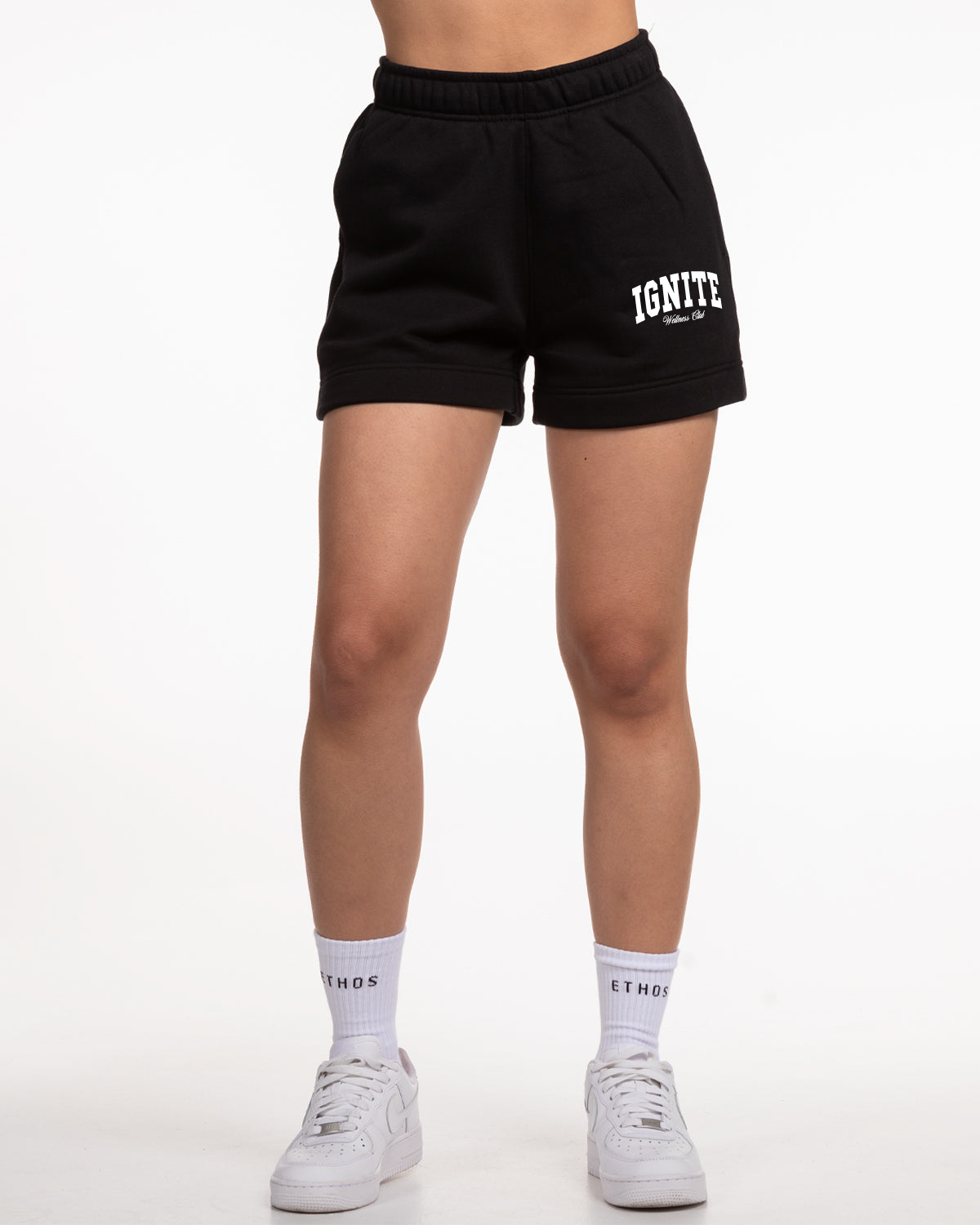 The Womens Sweat Shorts - Black - Ignite Barre - Left Leg Stacked - White Printed