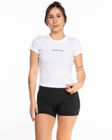 The Micro Rib Baby Tee - White - Ignite Barre - Center Chest - Black Printed