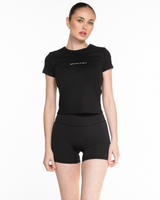 The Micro Rib Baby Tee - Black - Ignite Barre - Center Chest -  White Printed