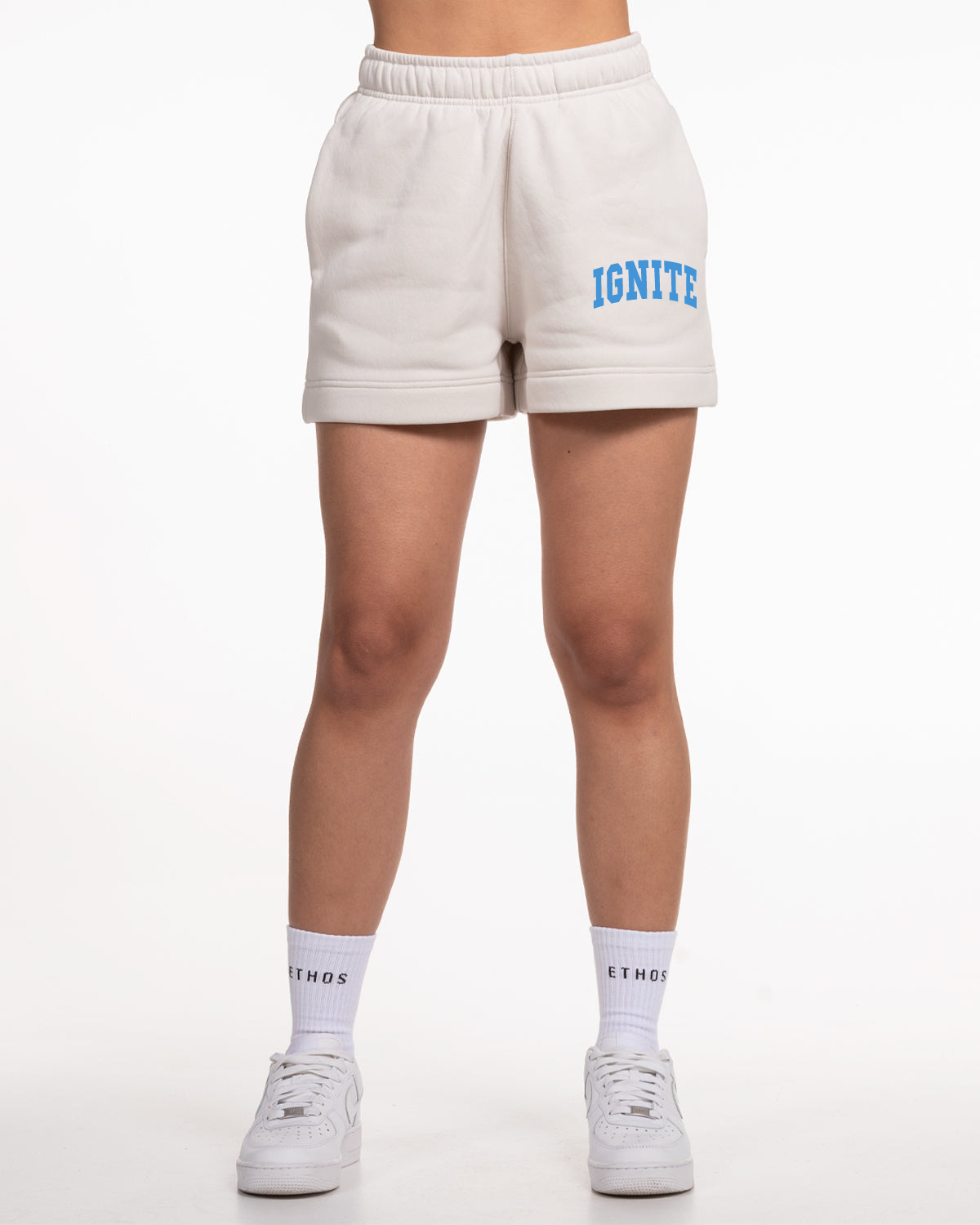 The Womens Sweat Shorts - Bone - Ignite Barre - Left Leg Stacked - UCLA Blue Printed